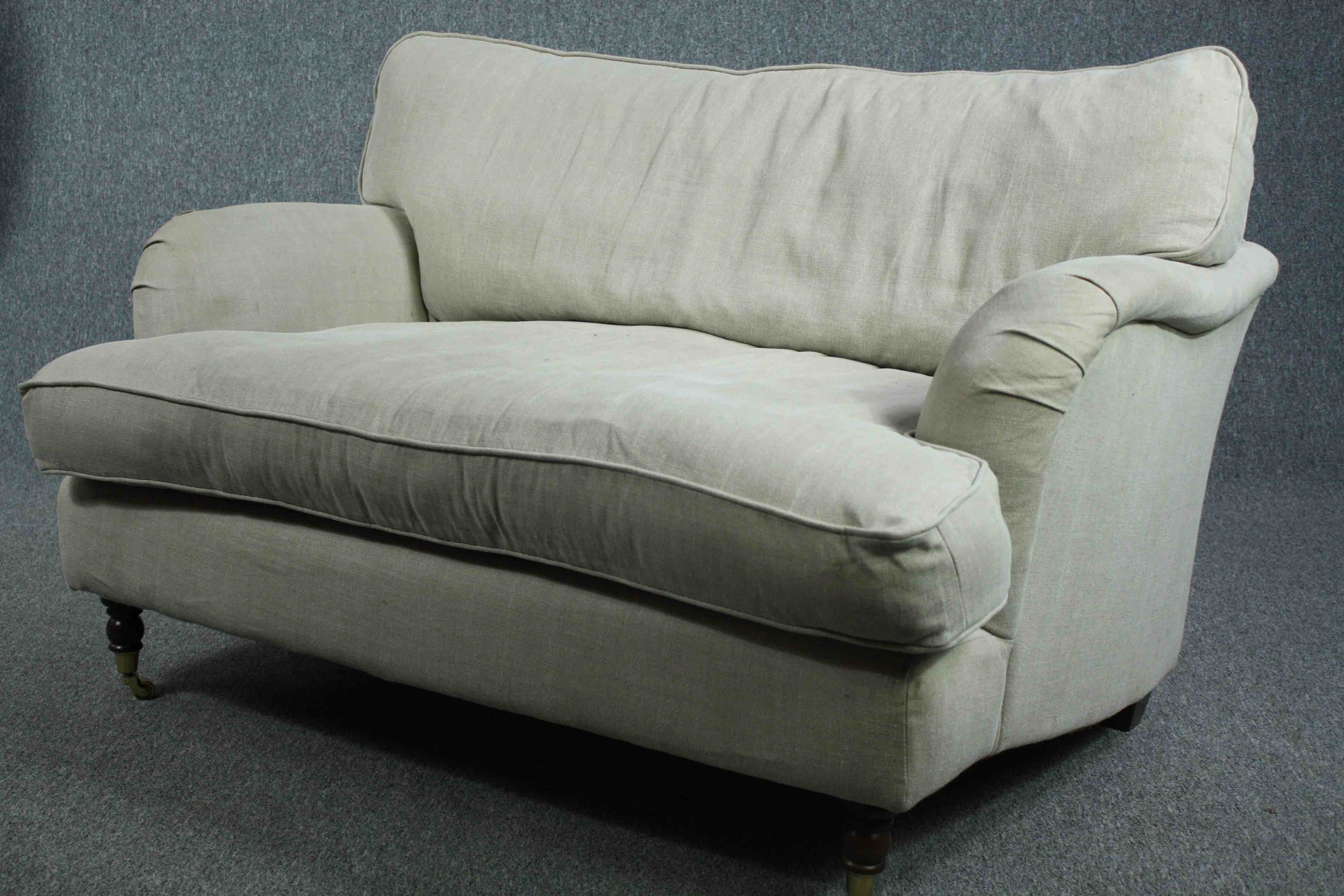 Sofa, contemporary in the Howard style on turned supports with brass cup casters. H.82 W.128 D.90cm. - Image 4 of 5