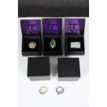 Five boxed silver and gemstone dress rings, set with opal, ammolite, tanzanite and orange