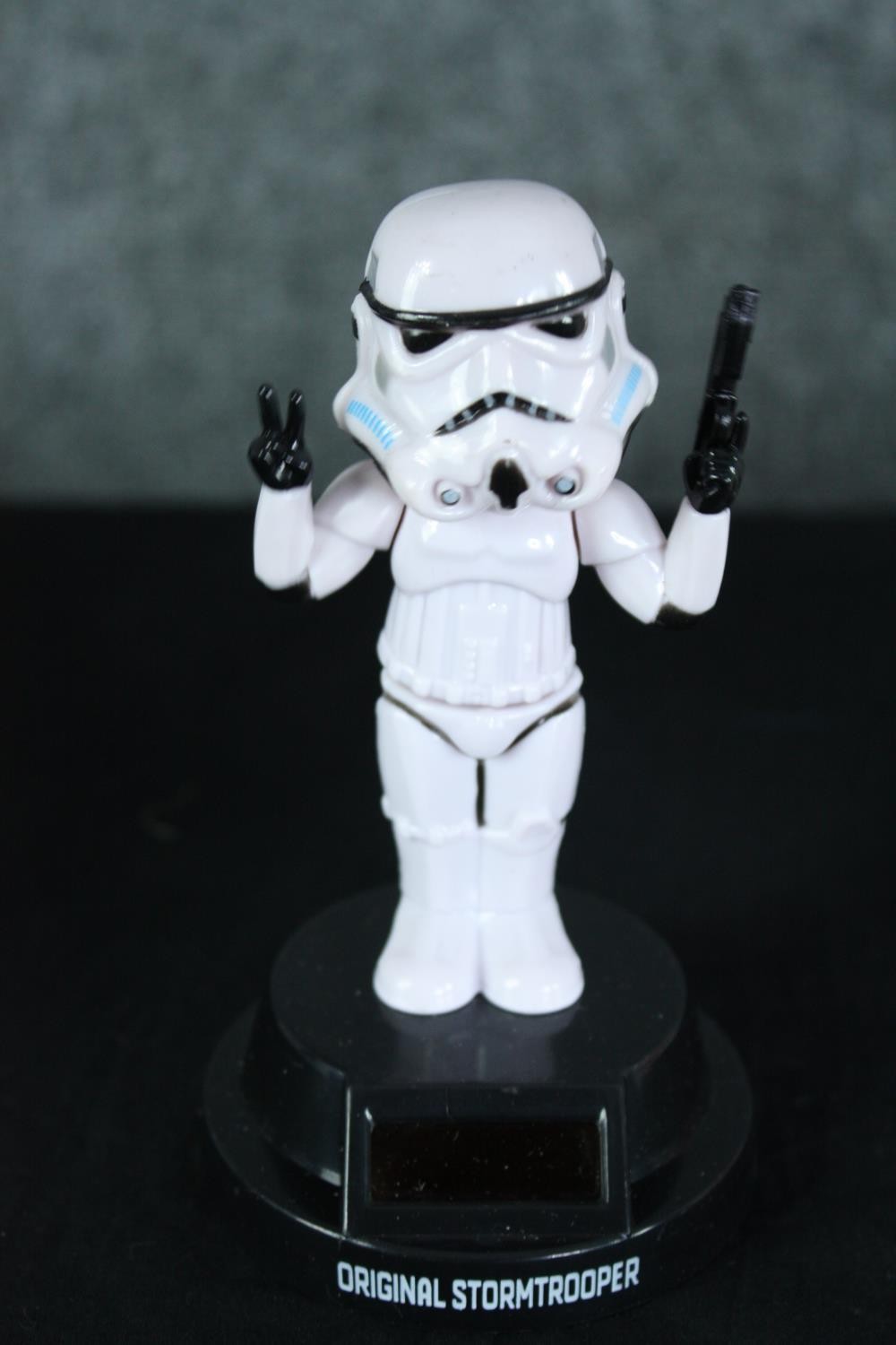 A collection of solar powered Star Wars Stormtrooper figures and a set of glasses. H.17 W.14 D.14cm. - Image 2 of 4