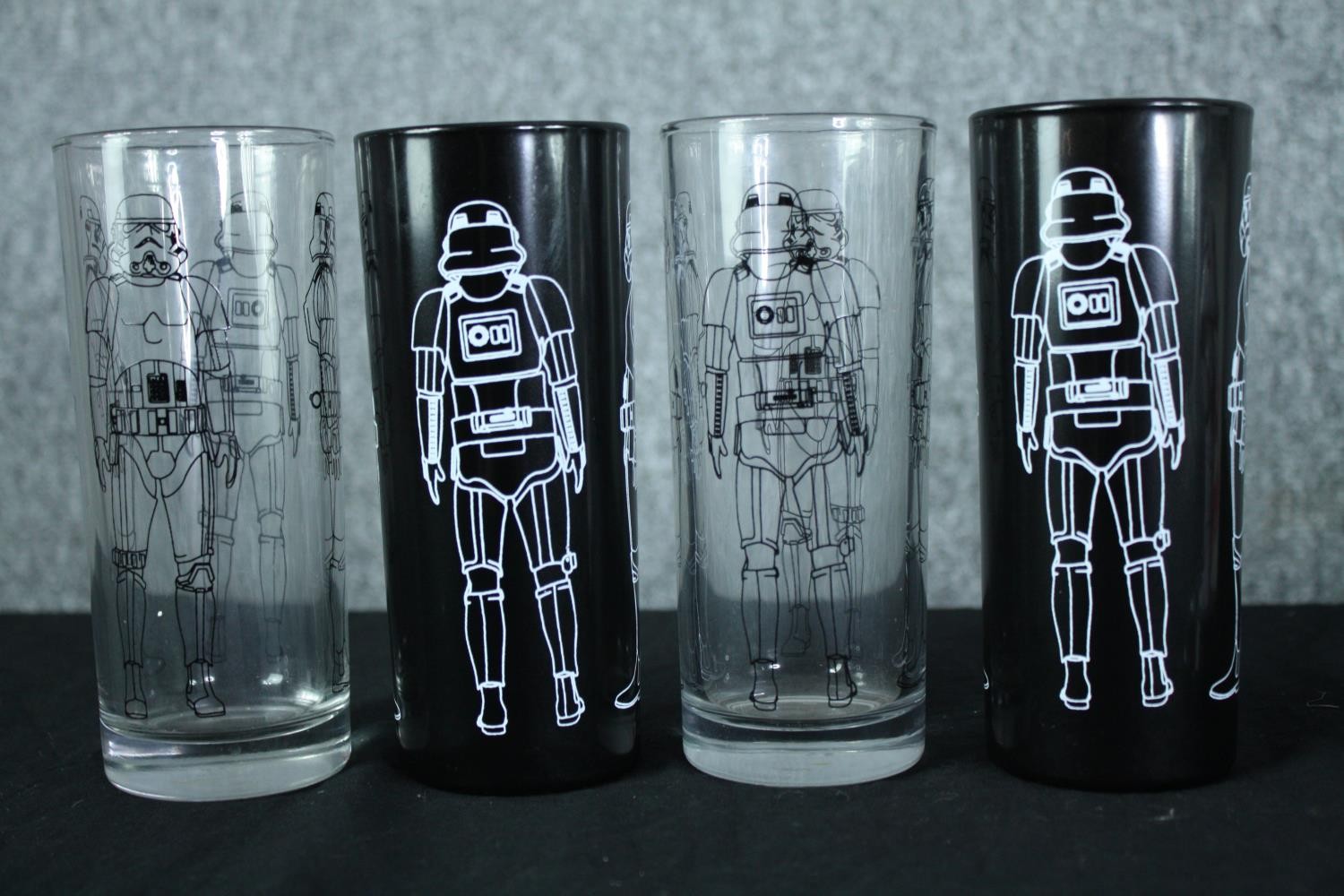 A collection of solar powered Star Wars Stormtrooper figures and a set of glasses. H.17 W.14 D.14cm. - Image 4 of 4