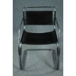 A mid century Breuer style chrome and leather cantilever armchair.