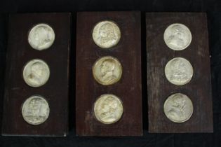 A collection of nineteenth century plaster medal dies mounted on wood. Including the Dupin A.M.J.