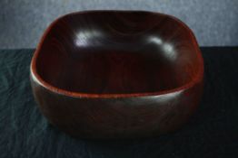 A mid century Danish Reducta Teak wooden salad bowl. Stamp to base. H.10 W.26 D.26 cm.