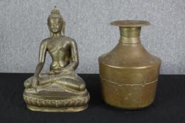 A brass Buddha and a water vessel. India. Twentieth century but maybe earlier. H.40 W.29 D.18 cm.