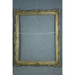 A large and ornate gilt frame. H.148 W.119 cm.