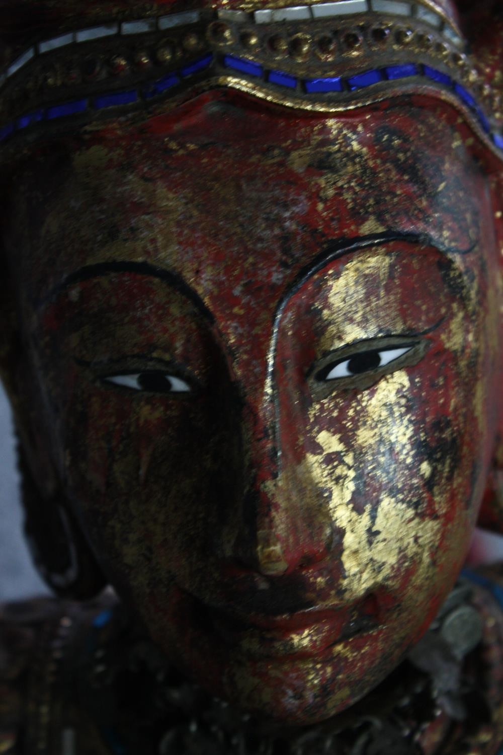 A large carved Buddha in a boat or canoe. Gilded and decorated with small mirror tiles. H.125 W. - Image 6 of 8