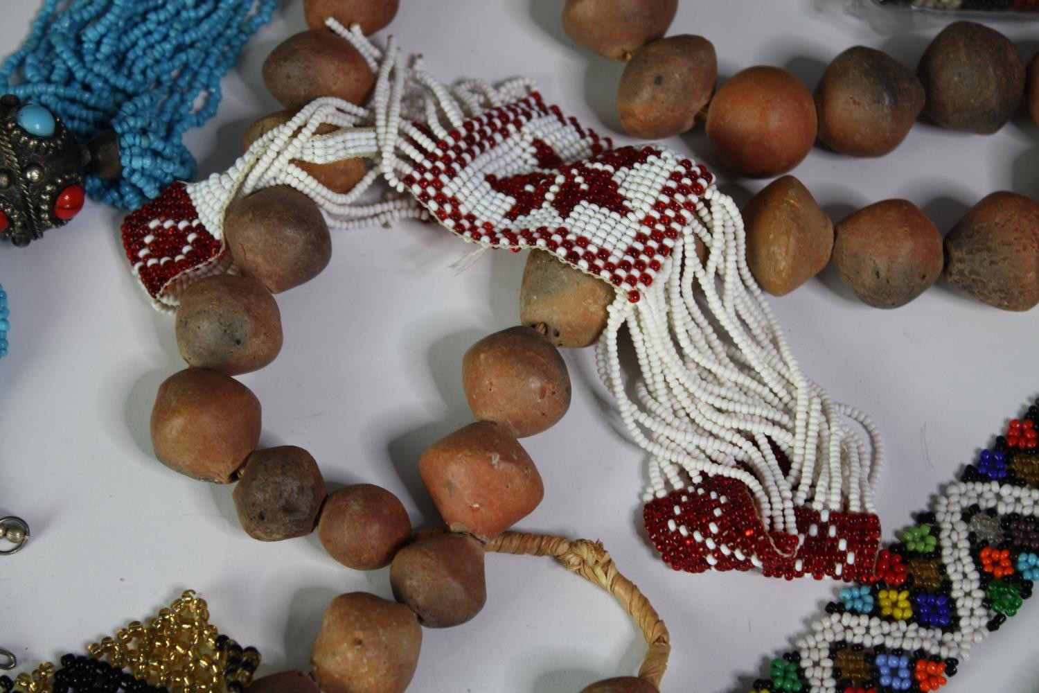 A collection of tribal beaded jewellery, including necklaces, belts and bracelets. With various - Image 8 of 8