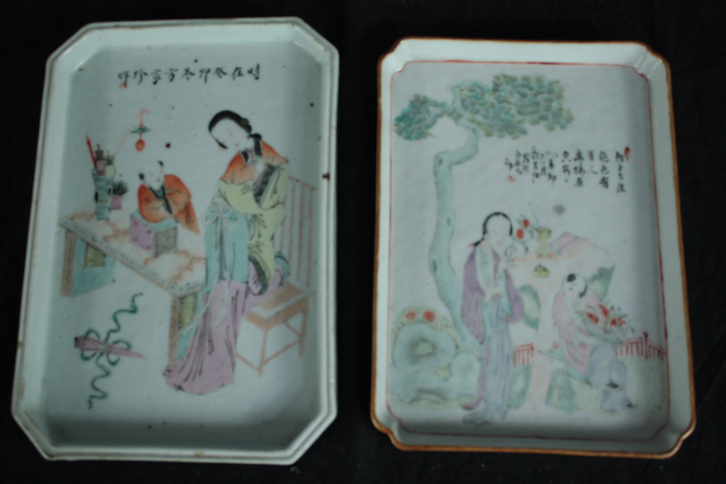 Two 19th century Chinese Famille Rose porcelain trays hand painted with figures. One of a scholar