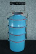 An old Tiffin box in a light blue finish with red edging. H.44 cm.