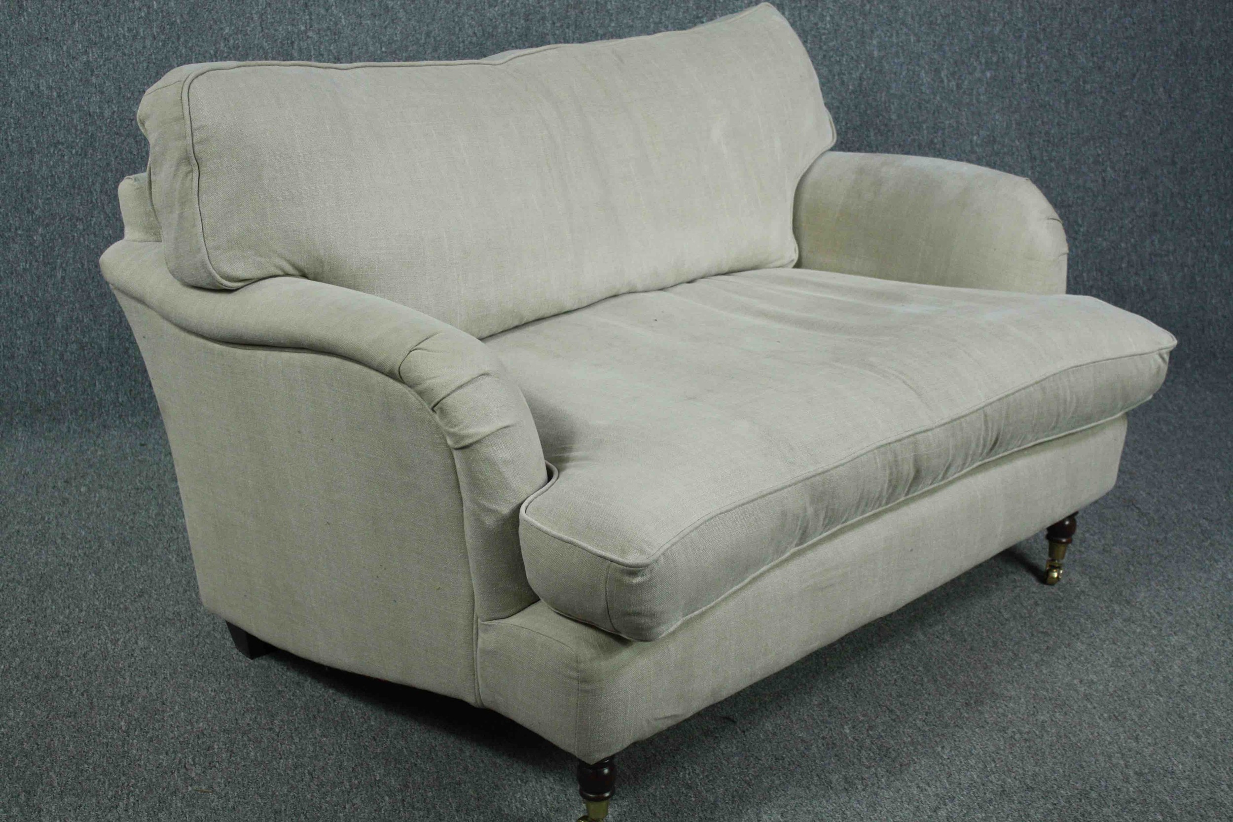Sofa, contemporary in the Howard style on turned supports with brass cup casters. H.82 W.128 D.90cm. - Image 2 of 5