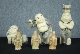 Six Japanese figures. Two sets of three. Hand painted resin. Twentieth century. H.17cm. (largest)