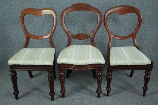 A pair of Victorian mahogany dining chairs and a similar chair