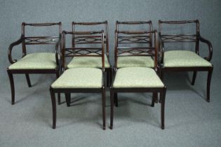 Dining chairs, a set of six Regency style mahogany, to include two carver armchairs.