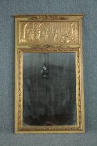 Pier mirror, 20th century Empire style, giltwood and gesso. H.130 W.78cm.