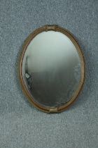Wall mirror, C.1900 carved giltwood. H.67 W.51cm.