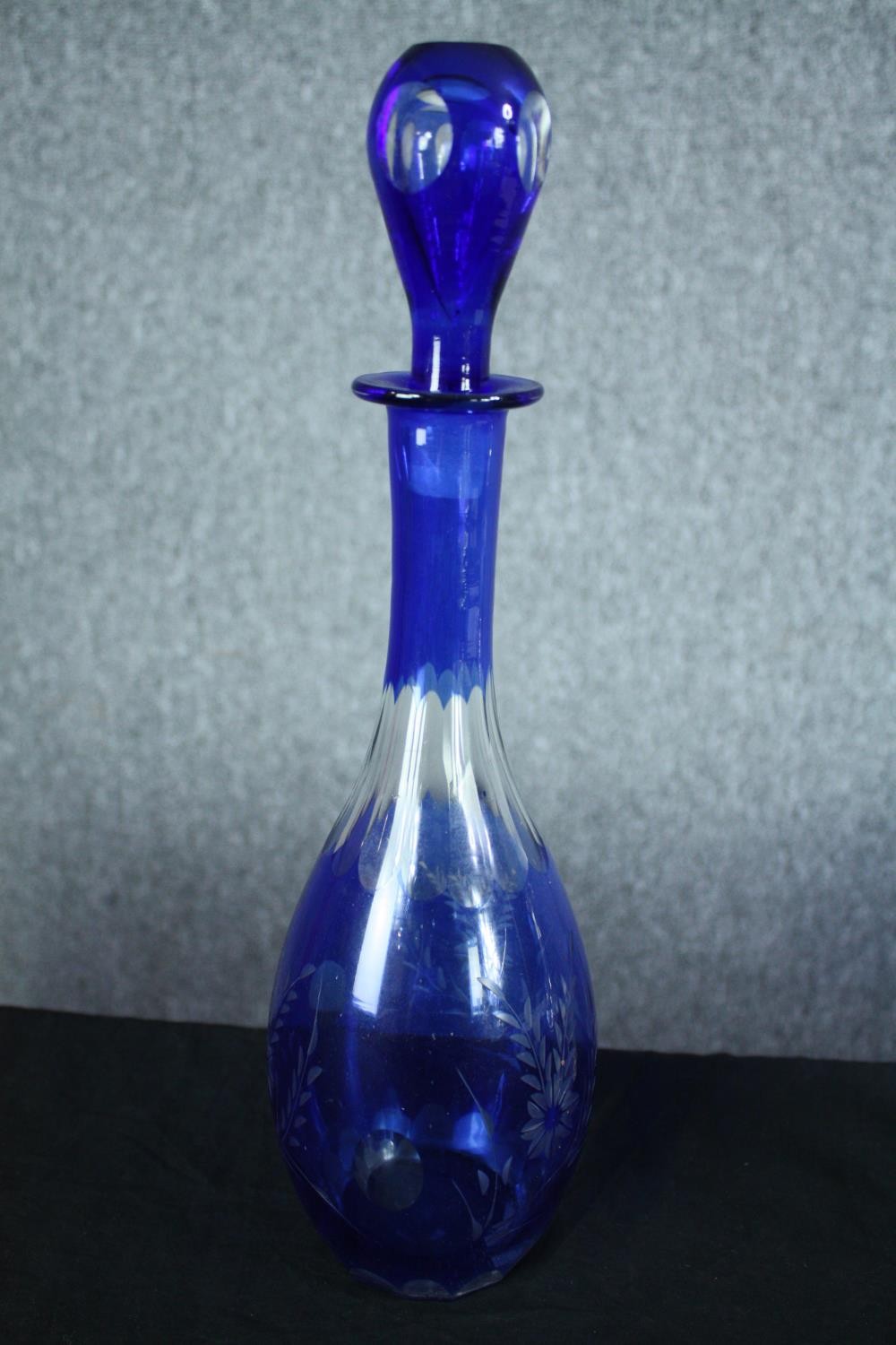 Two decanters. Blue glass with an etched floral pattern. The other, smaller and clear glass H. - Image 3 of 4