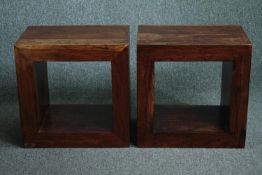 A pair of contemporary Eastern hardwood bedside or lamp tables. H.50 W.50. D.35cm. (each)