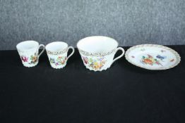 Four pieces of Dresden pottery with matching floral designs. Scalloped with gilt edging. Dia.15