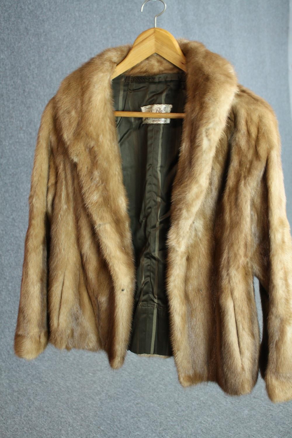 A vintage brown mink short fur coat by Scottish furriers A.E.Bell with dark green silk lining.