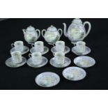 Tea set. Incomplete. Made up of seven cups and saucers, a teapot, sugar pot, creamer and three