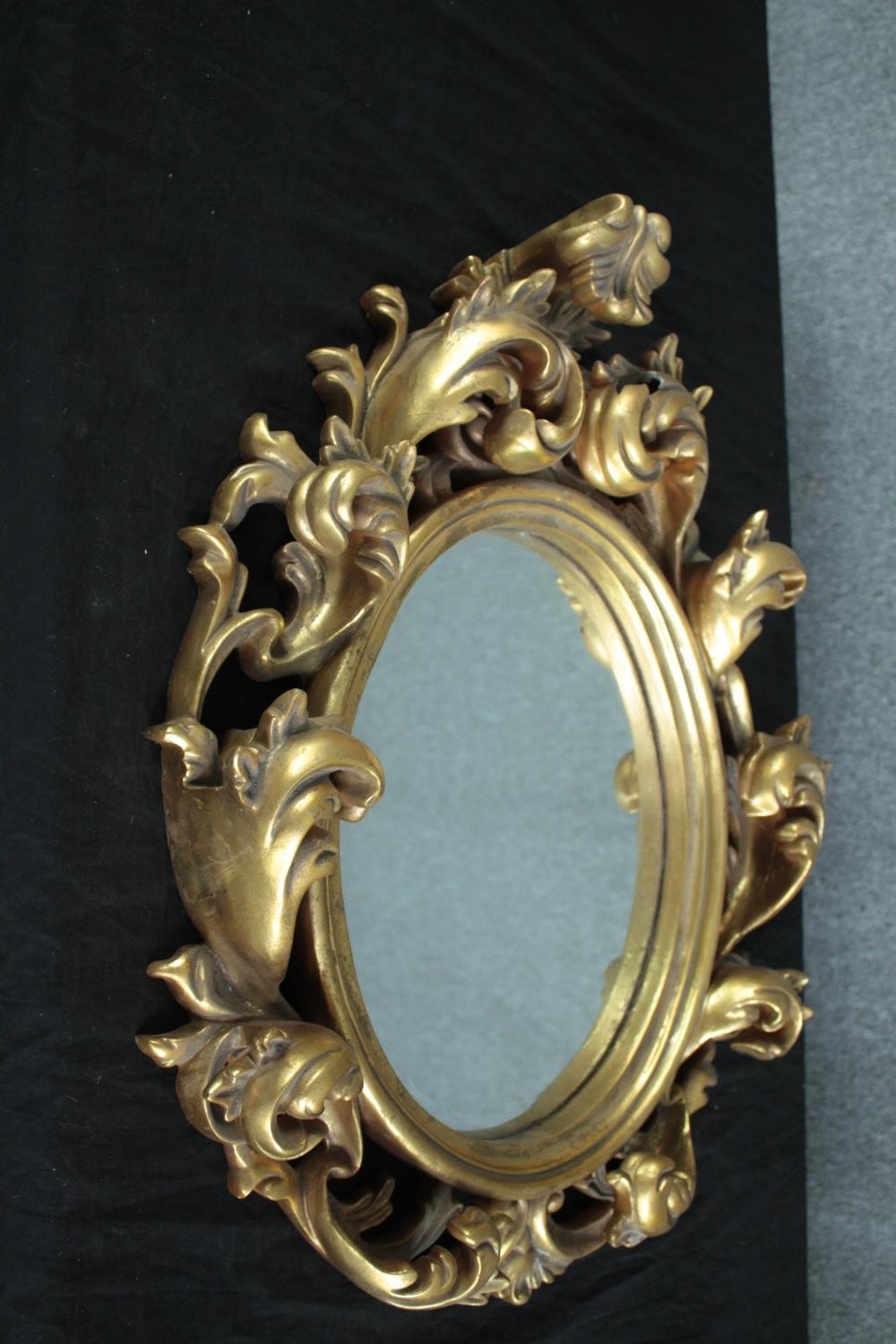 A Rococo style wall mirror in moulded gilt frame. H.65 W.50cm. - Image 4 of 5