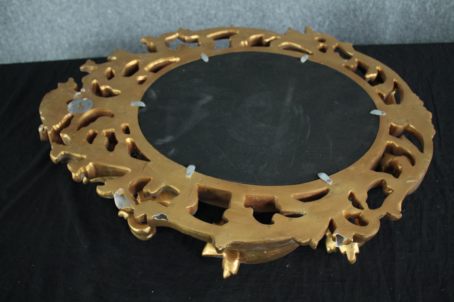 A Rococo style wall mirror in moulded gilt frame. H.65 W.50cm. - Image 5 of 5