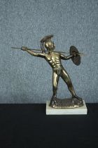 A spelter Spartan or Greek warrior finished in gilt. H.36 cm.