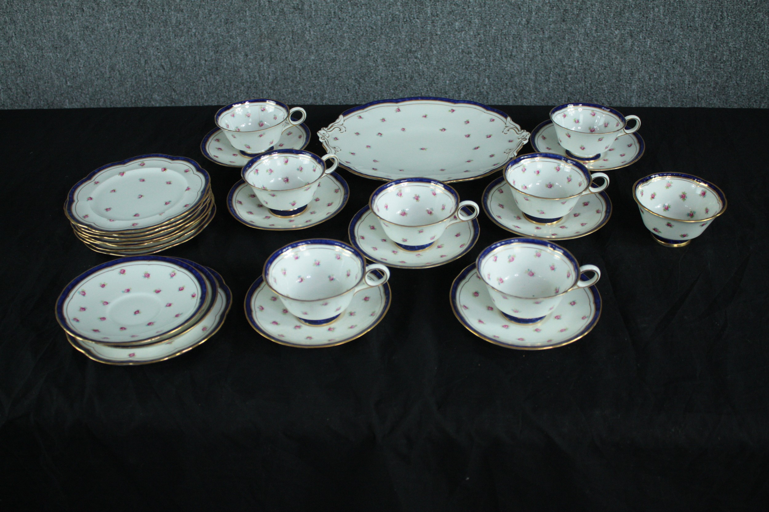 Cauldon tea set. Incomplete. Made up of eight cups and saucers, eight side plates, two saucers, a