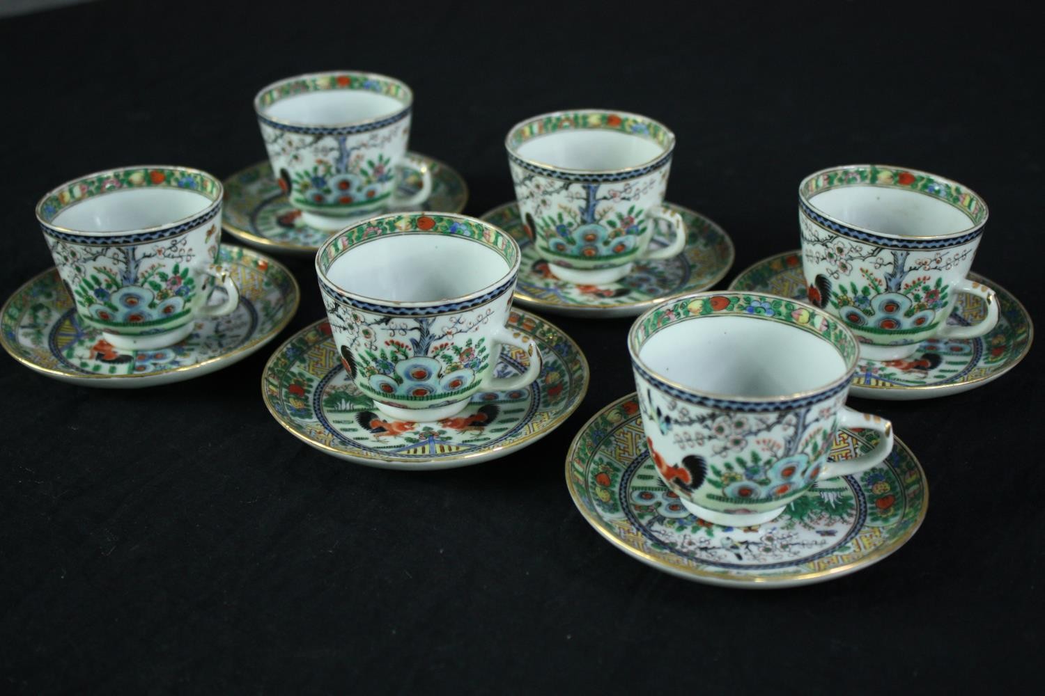 A set of tea cups and saucers. 'Made in China' probably for the export market. Hand painted and - Image 10 of 11