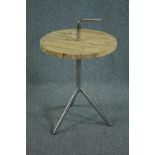 A contemporary industrial style occasional table. H.84 Dia.51cm.