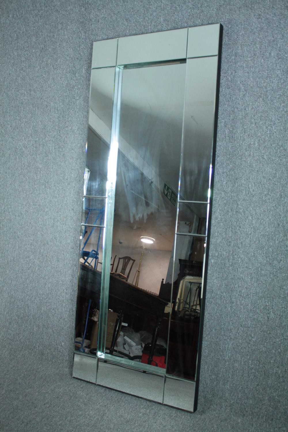 A contemporary full height wall mirror in glazed frame. H.180 W.70cm. - Image 2 of 3