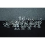 A collection of 19th and early 20th century glasses, including a set of six handled posset glasses