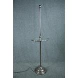 Floor standing lamp, chrome Art Deco style with a plate glass shelf at the centre. H.157 Dia.42 cm.