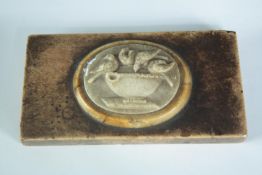 A Victorian Grand Tour carved marble paperweight, the central oval cartouche with relief of four