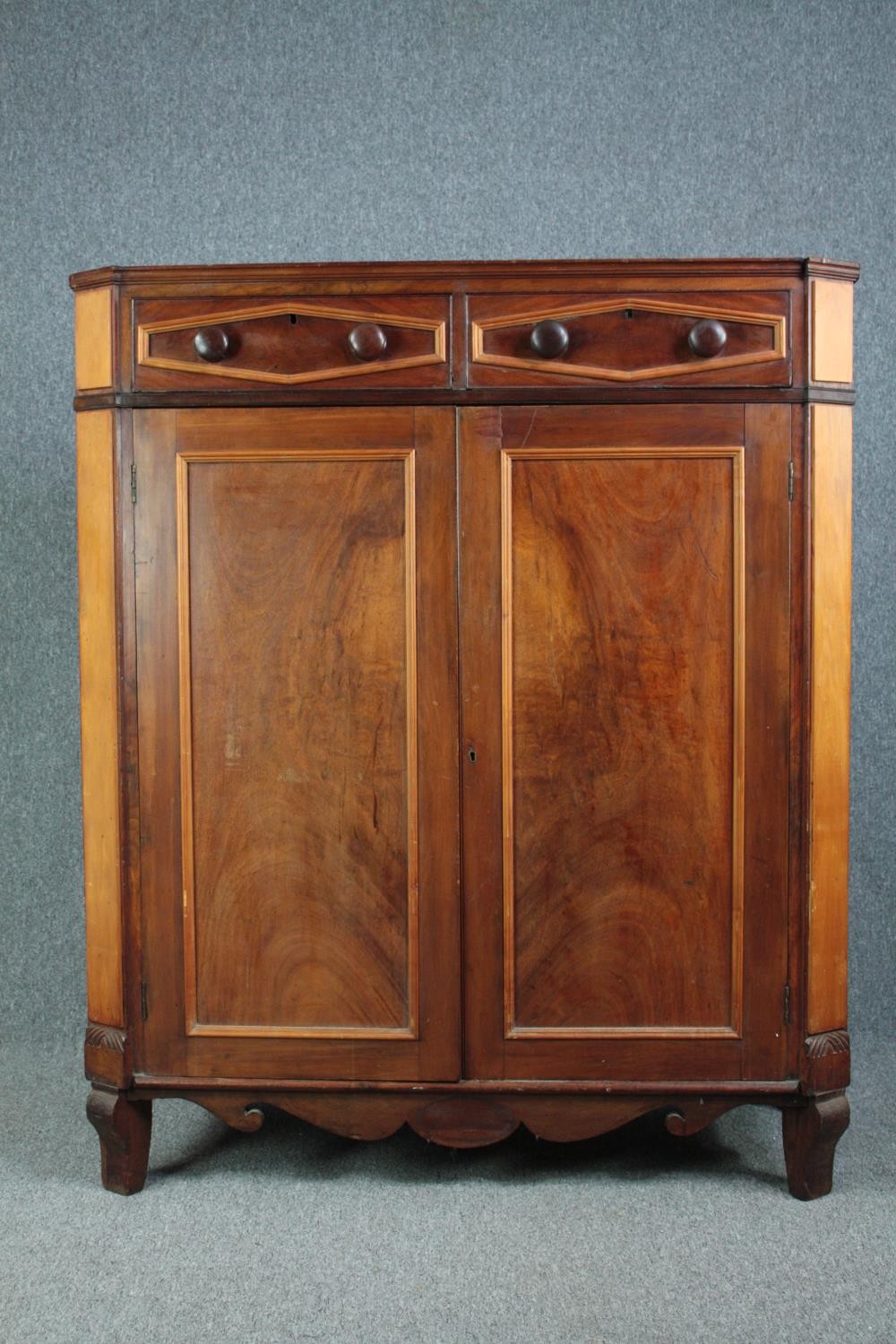 Cabinet, 19th century Continental flame mahogany. H.148 W.124 D.54cm. (Rear leg damaged as shown).