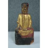 A carved Buddha hand painted and finished in gilt. Early twentieth century. H.24cm.