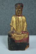 A carved Buddha hand painted and finished in gilt. Early twentieth century. H.24cm.