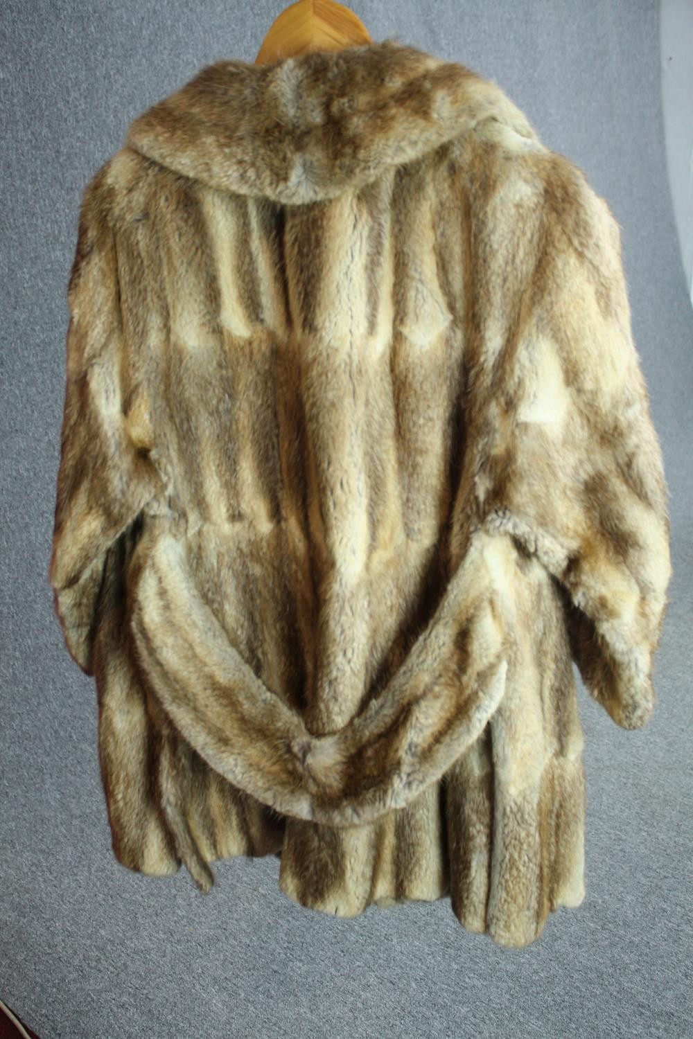 A vintage Robert Fraser winter fur coat with wide collar. Designer label to the inside of collar. - Image 3 of 10