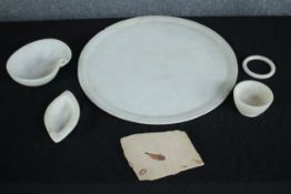 A fossilised fish and a mixed collection of alabaster bowls and a bangle. Dia.43cm. (largest)