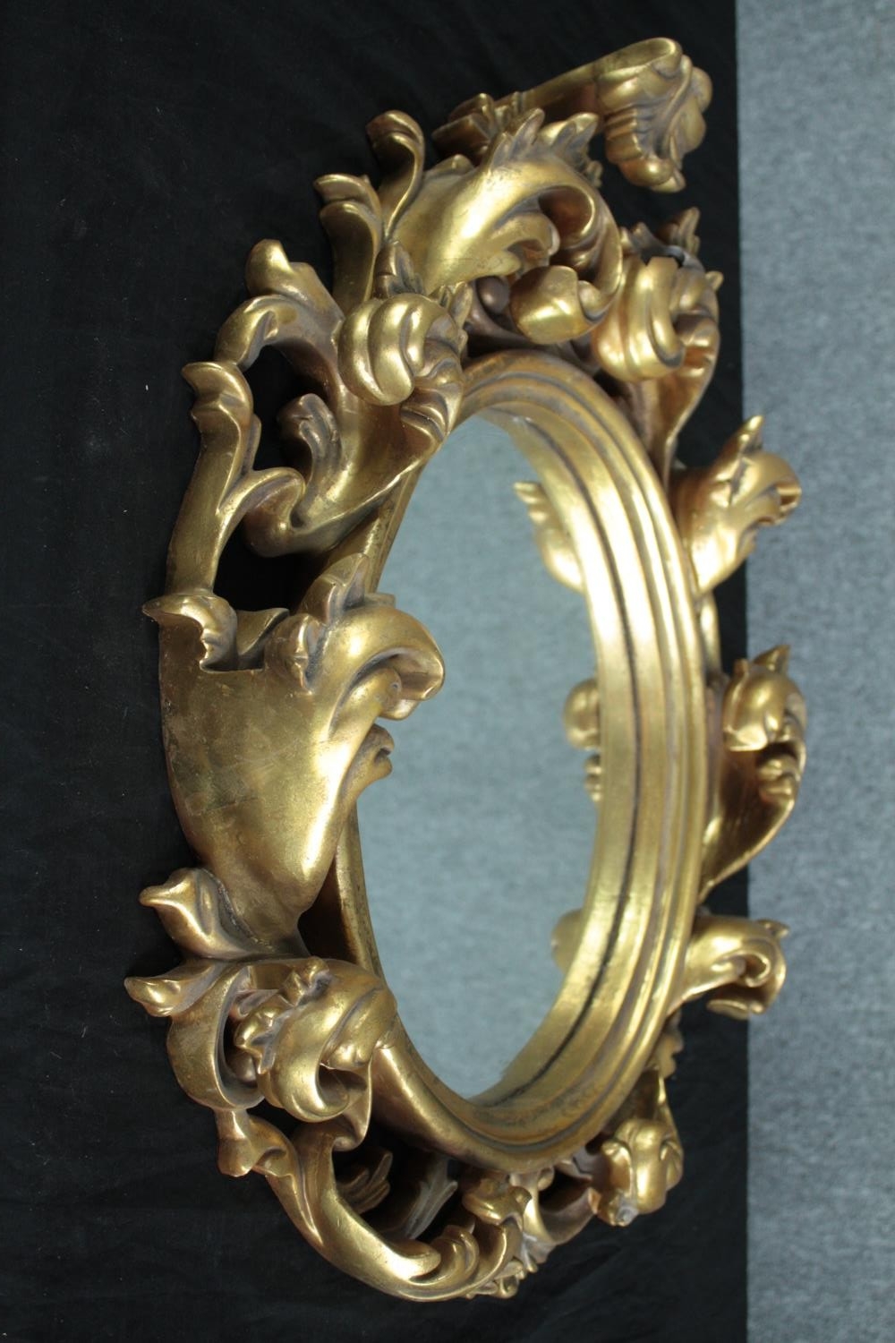 A Rococo style wall mirror in moulded gilt frame. H.65 W.50cm. - Image 3 of 5