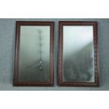 A pair of C.1900 oak framed mirrors. H.93 W.55cm. (each)