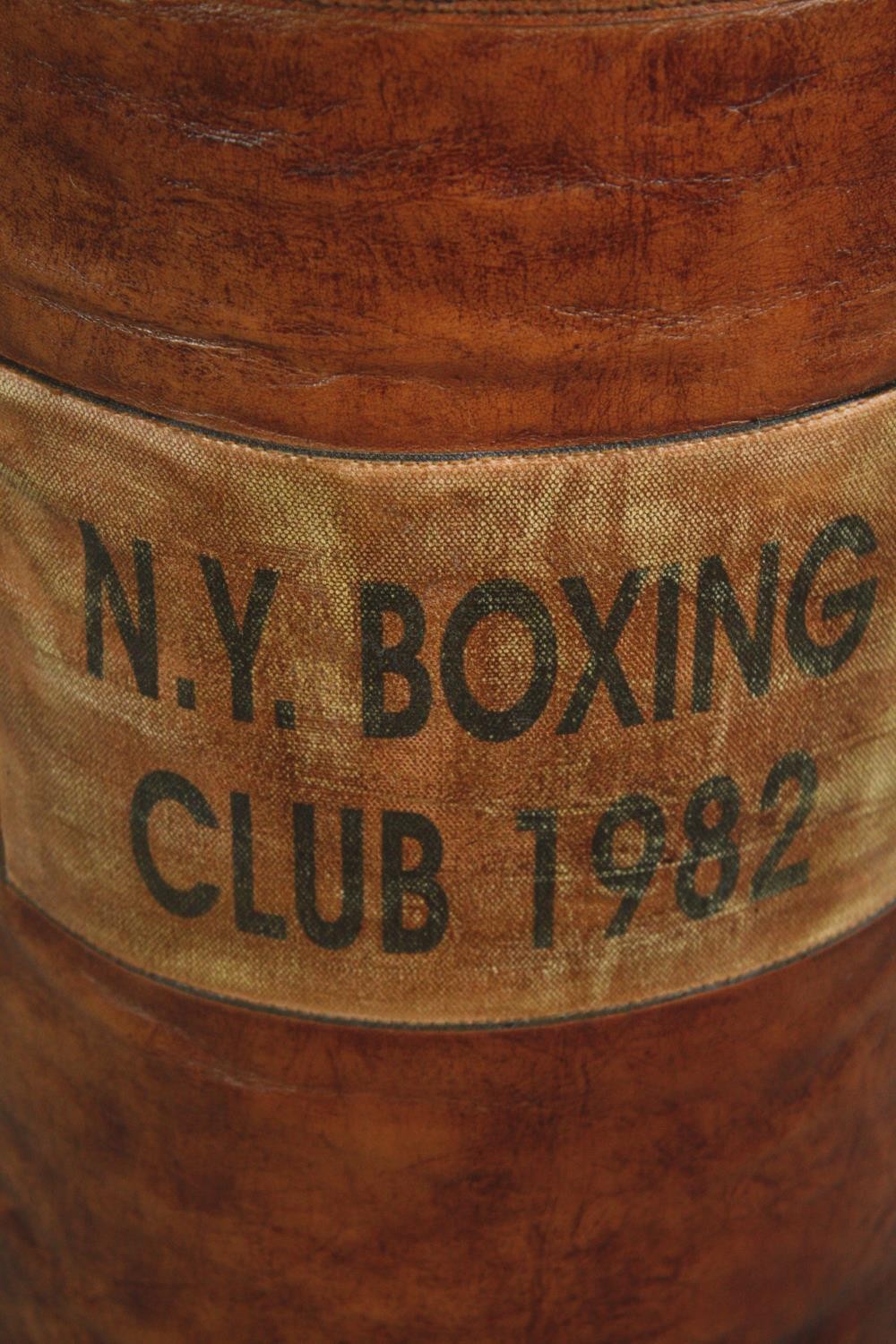 A boxing punchbag from the 'New York Boxing Club' dated 1982. Leather. H.67 Dia.32 cm. - Image 2 of 3