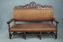 Sofa, 19th century oak framed in the Carolean style. H.126 W.170 D.67cm.