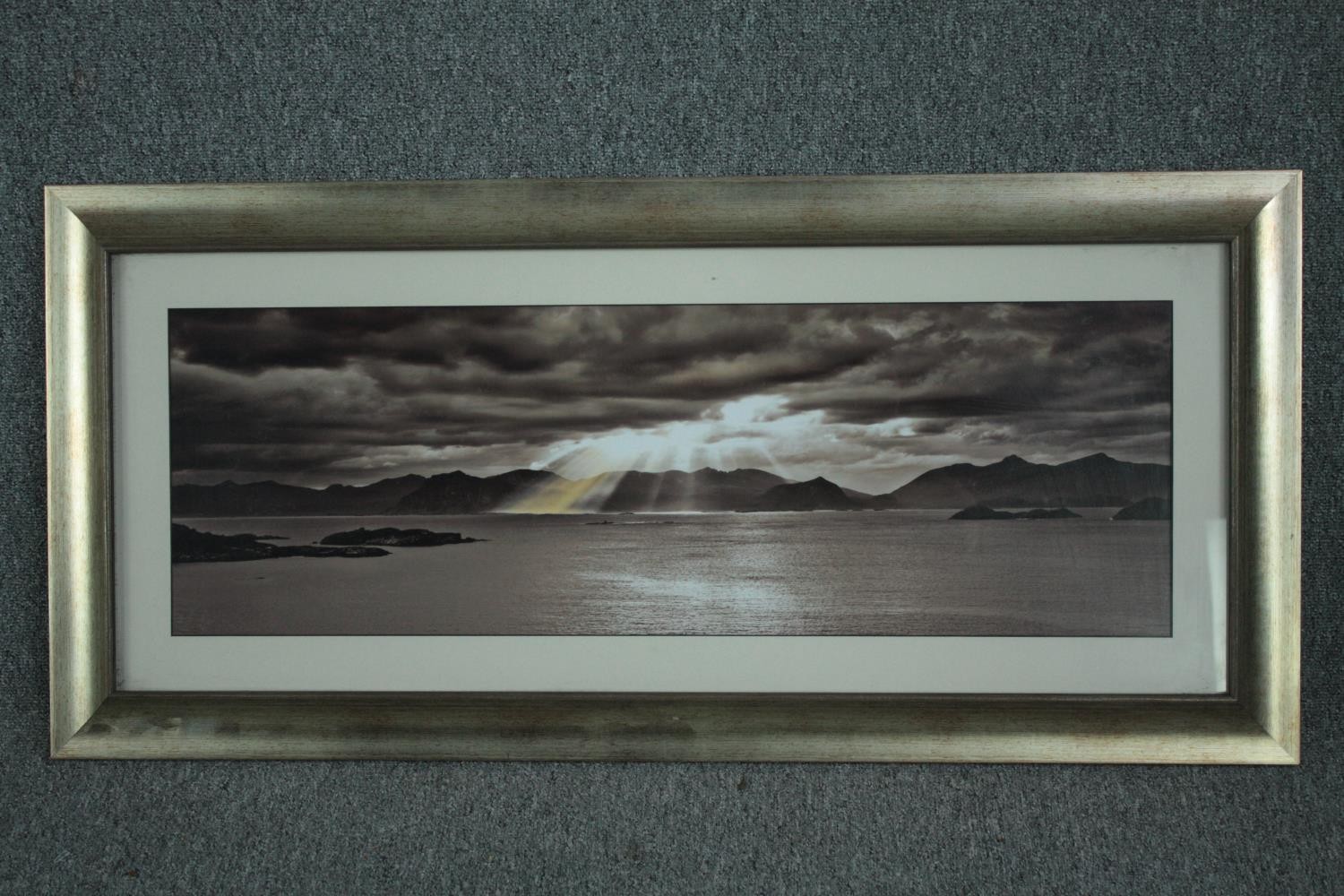 A large framed landscape print. H.55 W.114 cm. - Image 2 of 3