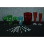 A mixed collection of coloured studio glass including, glass straws, stirrers, cup and a vase. H.