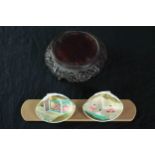 A pair of Japanese hand painted shells and a Chinese pierced hardwood stand. The shells finished