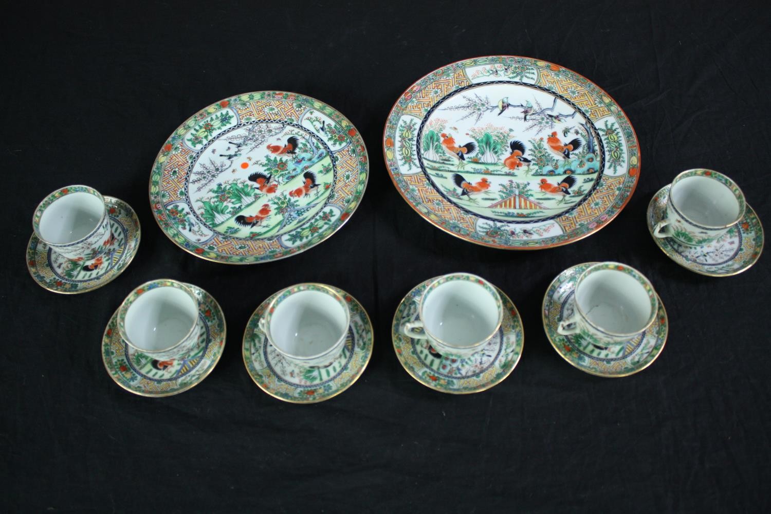A set of tea cups and saucers. 'Made in China' probably for the export market. Hand painted and