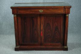 Chiffonier, early 19th century rosewood with ormolu mounts. Has a later protective plate glass
