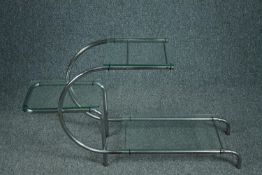 After Emile Guillot, a 1930's plate glass and chrome etagere in the Bauhaus style. H.56 W.105 D.