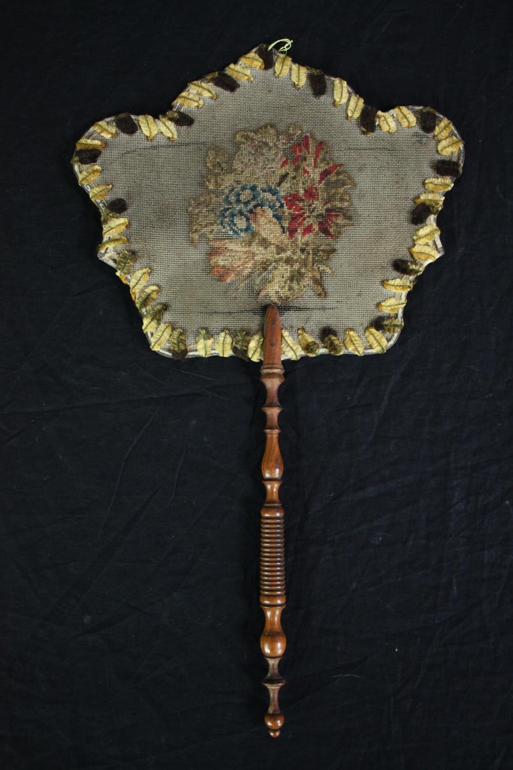 Two early 19th century embroidered floral hand held face screens with turned wooden handles. H.42 - Image 2 of 4